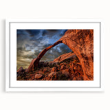 Abstract art print of Arches National Park in muted earth tones on a framed white mat, ideal for dining room decor.