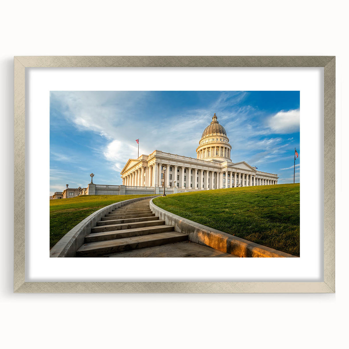 Abstract Salt Lake City skyline in textured art style with muted blue and gray tones on a framed silver mat.