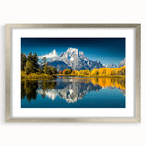 Textured art of the Grand Tetons in muted earth tones on a framed silver mat, suitable for bedroom decor.