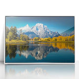 Acrylic print of the Grand Tetons in Wyoming with a white frame, featuring soft natural colors.