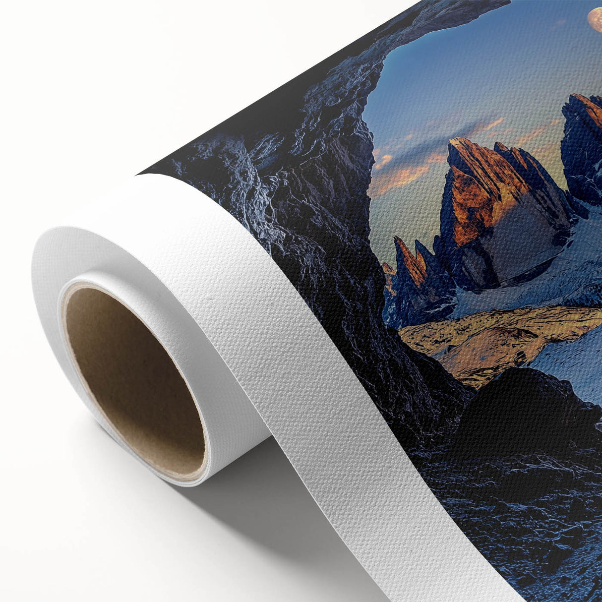 Rolled canvas artwork depicting a vibrant landscape scene with caves, showcasing rich colors and intricate details, packaged securely in a protective tube.