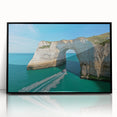 Framed acrylic artwork showcasing a dramatic landscape of cliffs, with a sleek black frame, designed to enhance modern home decor and evoke a sense of adventure.