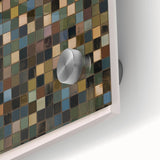 Close-up of a vibrant abstract geometric acrylic glass artwork showcasing a blend of bold colors and sharp angles, ideal for modern home decor and artistic display.