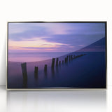 Framed acrylic artwork showcasing a serene beach landscape with vibrant colors and silver accents, perfect for enhancing home decor and coastal-themed interiors.