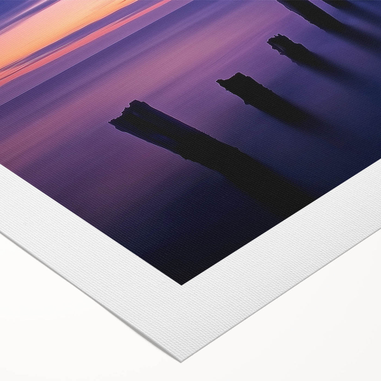 Rolled canvas artwork depicting a serene beach landscape with vibrant blue skies and golden sands, elegantly packaged in a protective cardboard tube for safe shipping.