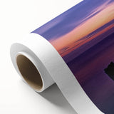 Rolled canvas depicting a vibrant beach landscape with serene turquoise waters and golden sands, elegantly packaged in a protective cardboard tube for safe shipping.