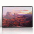 Framed acrylic artwork showcasing a stunning landscape of canyons in rich earth tones, with a sleek black frame enhancing its modern appeal, perfect for home decor.