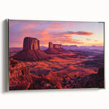 Framed canvas artwork showcasing a stunning landscape of canyons with vibrant colors, presented in a sleek silver frame, perfect for modern home decor.