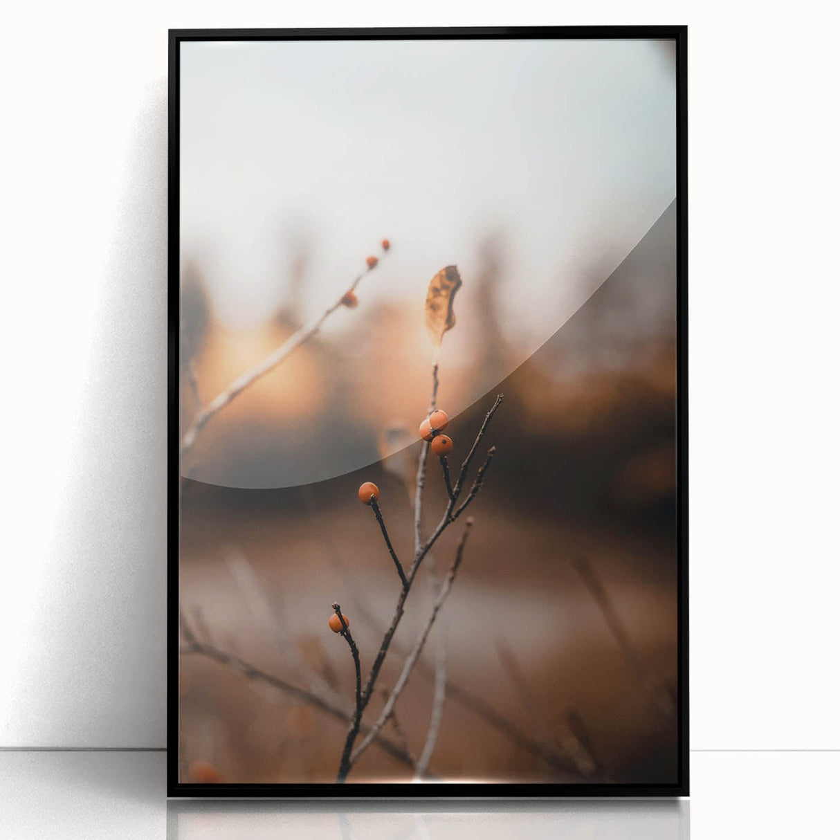 Large abstract wall art depicting autumnal trees in earth tones, framed in black acrylic.
