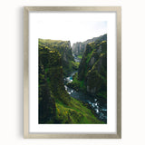 Textured abstract art print in shades of green and blue, framed in silver, ideal for bedroom wall decor.