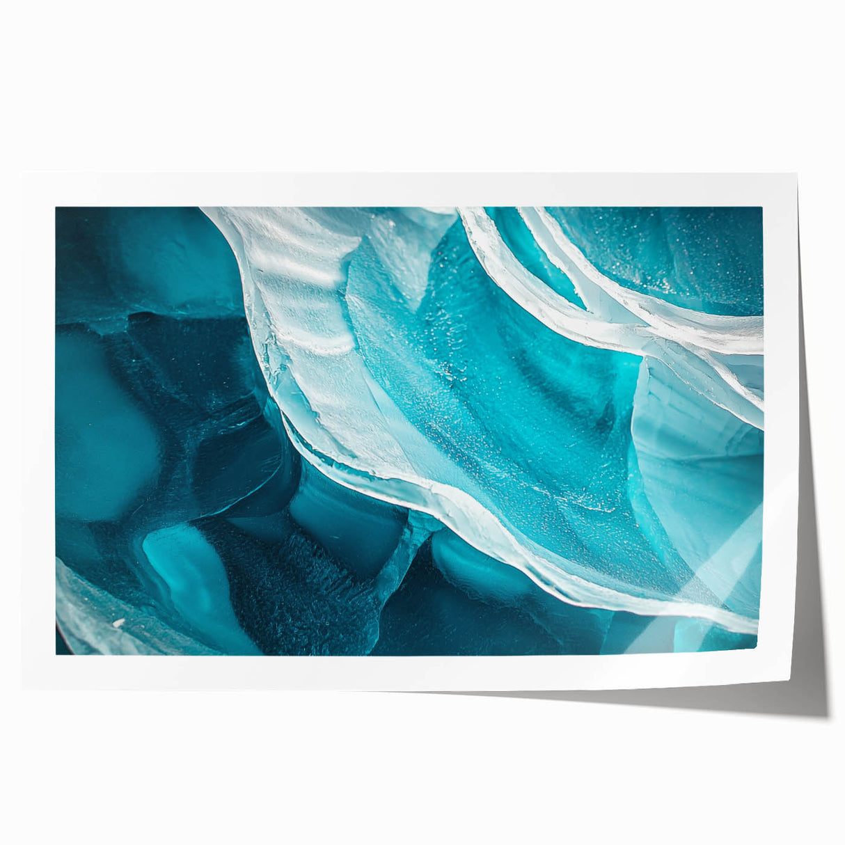 Rolled print showcasing a vibrant landscape with caves, featuring rich colors and textures, ideal for home decor, packaged securely in a cardboard tube.