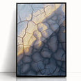 Framed acrylic artwork showcasing a stunning cliff landscape with vivid colors, set against a black frame, perfect for modern home decor. This piece adds a bold artistic touch to any living space.
