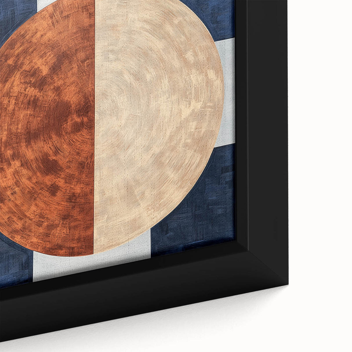 Close-up view of an abstract geometric framed canvas featuring bold shapes in vibrant colors, ideal for modern decor and artistic spaces.