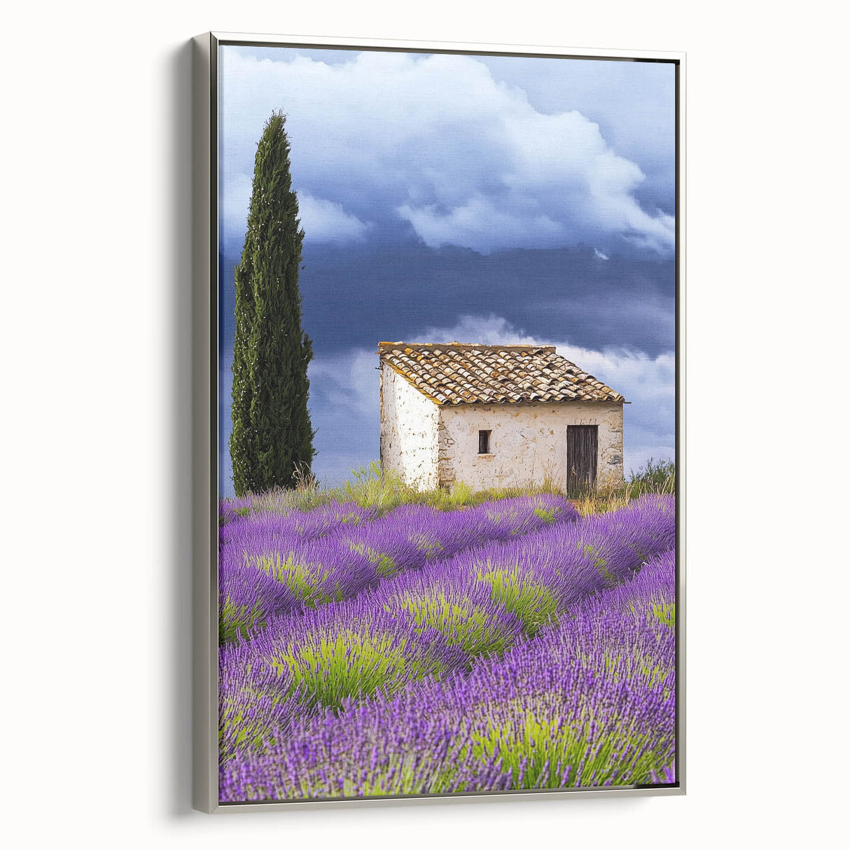 Framed canvas artwork showcasing a picturesque countryside landscape in vibrant colors, mounted in a sleek silver frame, ideal for home decor enhancement.