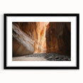 Framed landscape artwork depicting a serene cave scene, featuring a black mat border and sleek black frame, perfect for modern home decor and nature enthusiasts.