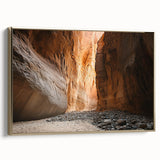 Framed canvas artwork showcasing a stunning landscape scene with caves and golden accents, viewed from the side, ideal for enhancing home decor with natural beauty.