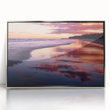 Framed acrylic artwork depicting a serene beach landscape with soft pastel colors, capturing waves and sandy shores, perfect for coastal-themed decor.