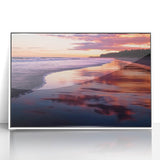 Framed acrylic wall art depicting a serene beach landscape with vibrant colors, set in a sleek white frame, perfect for enhancing modern home decor.
