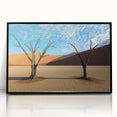 Framed acrylic artwork showcasing a desert landscape with vibrant colors and intricate details, set in a sleek black frame, perfect for home decor.
