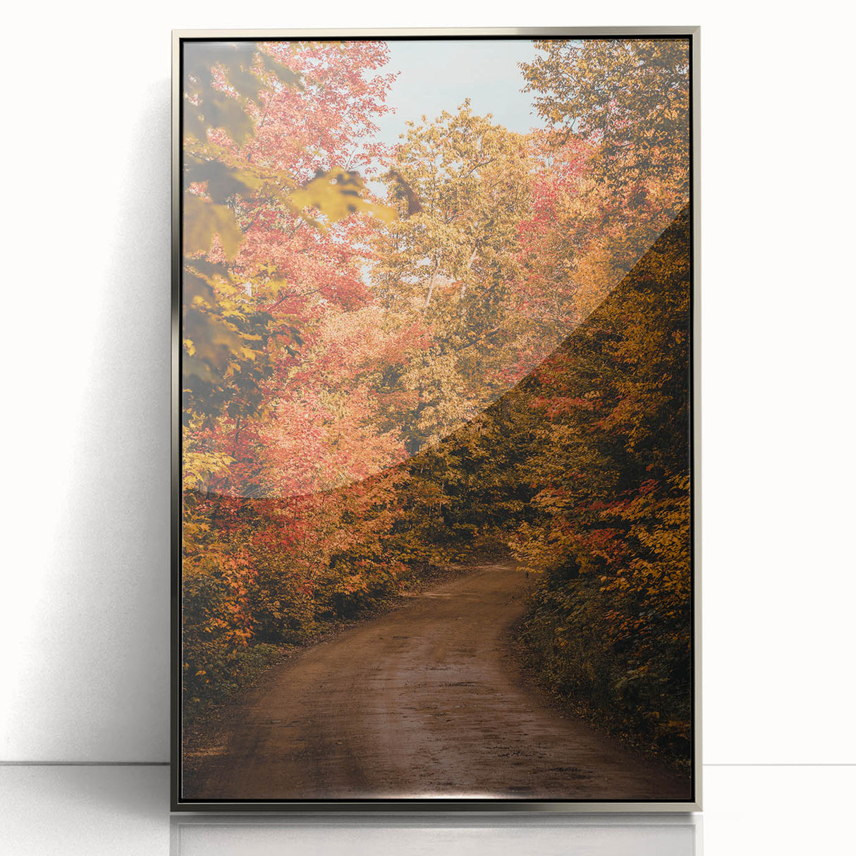 Mid-century modernist art depicting an abstract fall landscape in warm orange and brown tones, framed in silver acrylic.