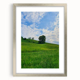 Textured abstract art print in soft green and white tones on a silver-framed canvas, suitable for bedroom decor.