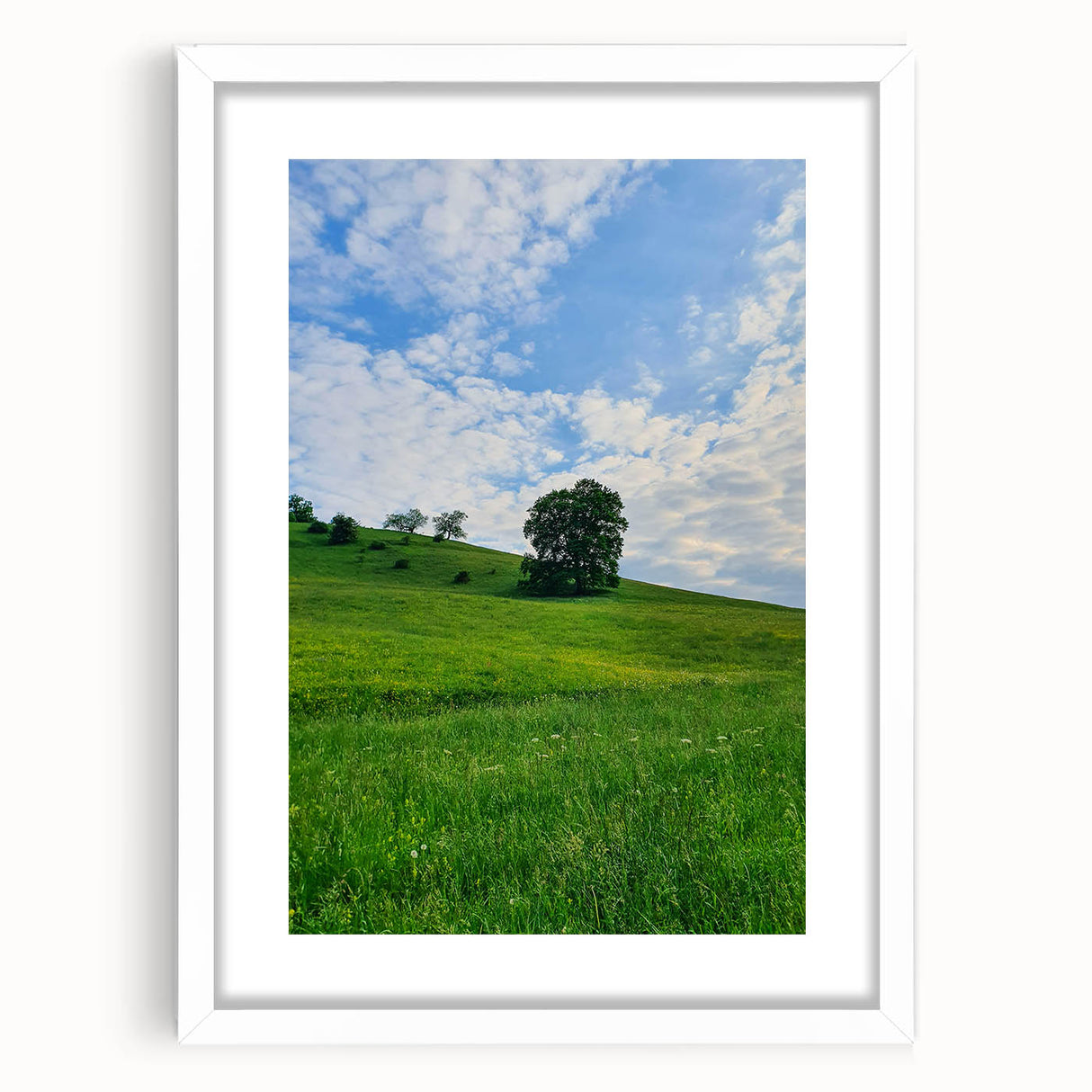 Abstract art print featuring swirling pastel hues on a white framed canvas, suitable for bedroom or dining room decor.