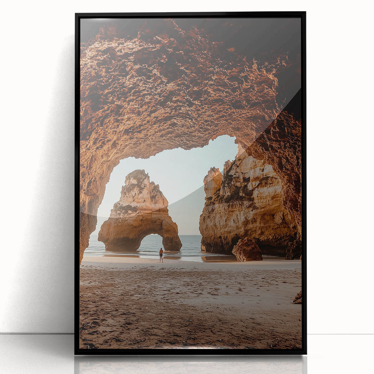 Framed acrylic landscape artwork depicting a serene cave scene with vibrant colors, designed to enhance home decor. Black frame adds a modern touch.