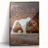 Framed acrylic artwork showcasing a stunning landscape with intricate cave formations and a shimmering gold front, ideal for contemporary home decor.