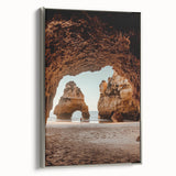 Framed canvas artwork showcasing a stunning landscape of caves, featuring a silver frame and a side view that highlights the vibrant colors and intricate details, perfect for enhancing home decor.