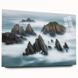 Stunning acrylic landscape artwork showcasing dramatic cliffs against a vibrant sunset sky, presented in a sleek glass frame, ideal for modern home decor.
