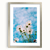 Textured abstract art print featuring soft green and white hues on a silver-framed canvas, suitable for bedroom decor.