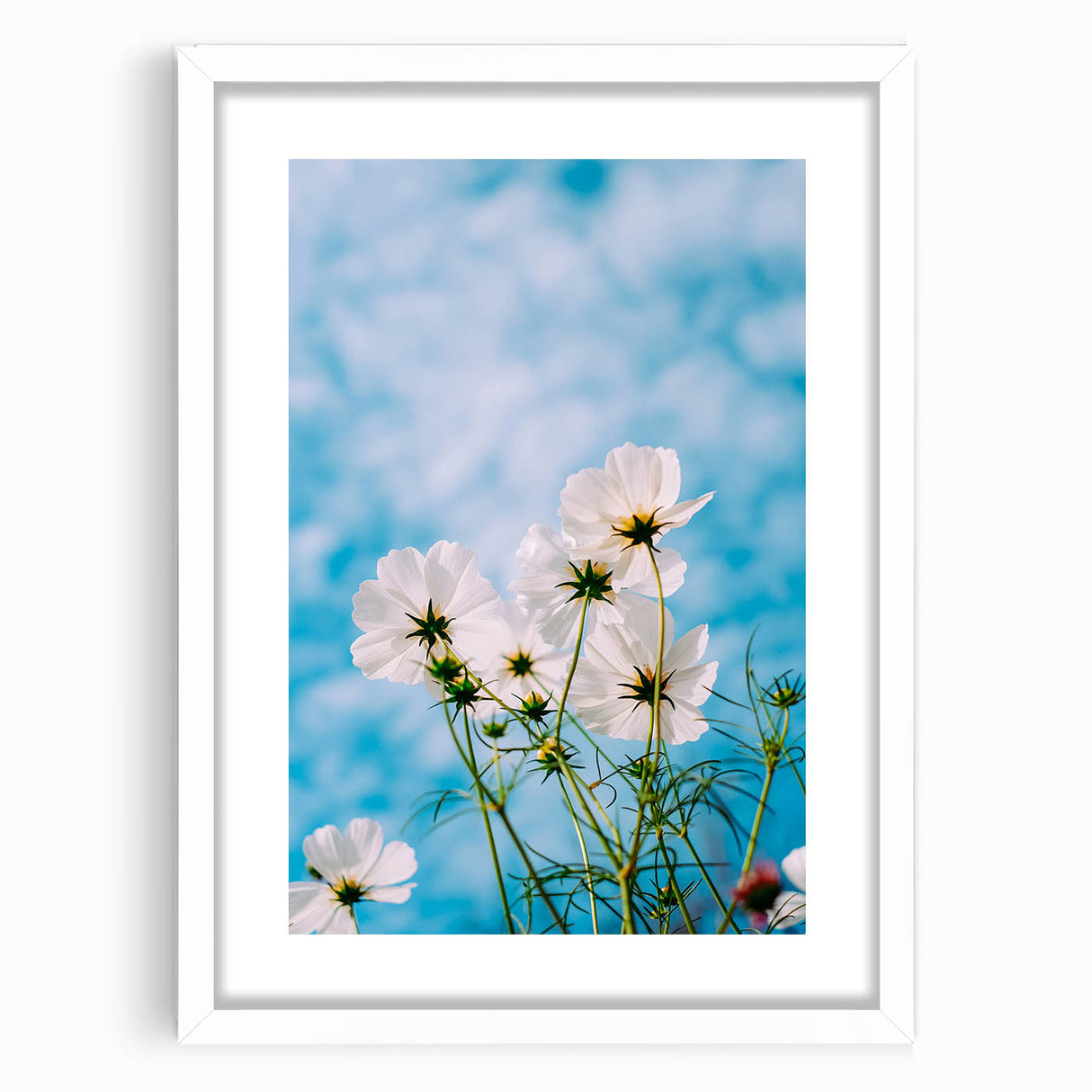 Abstract art print featuring swirling pastel shades on a white framed canvas, ideal for dining room decor.