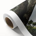 Rolled canvas print showcasing a stunning landscape of a medieval castle surrounded by lush greenery, designed for wall decor enthusiasts, packed securely in a protective tube.