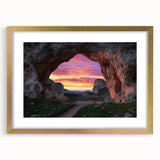 Elegant gold-framed landscape artwork featuring a serene cave scene, meticulously matted for a refined presentation. Ideal for enhancing home decor with a touch of nature's beauty.