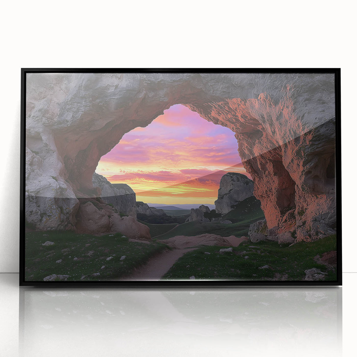 Framed acrylic artwork showcasing a vibrant landscape scene depicting a cave, featuring a sleek black frame and elegant front view design, perfect for modern home decor.