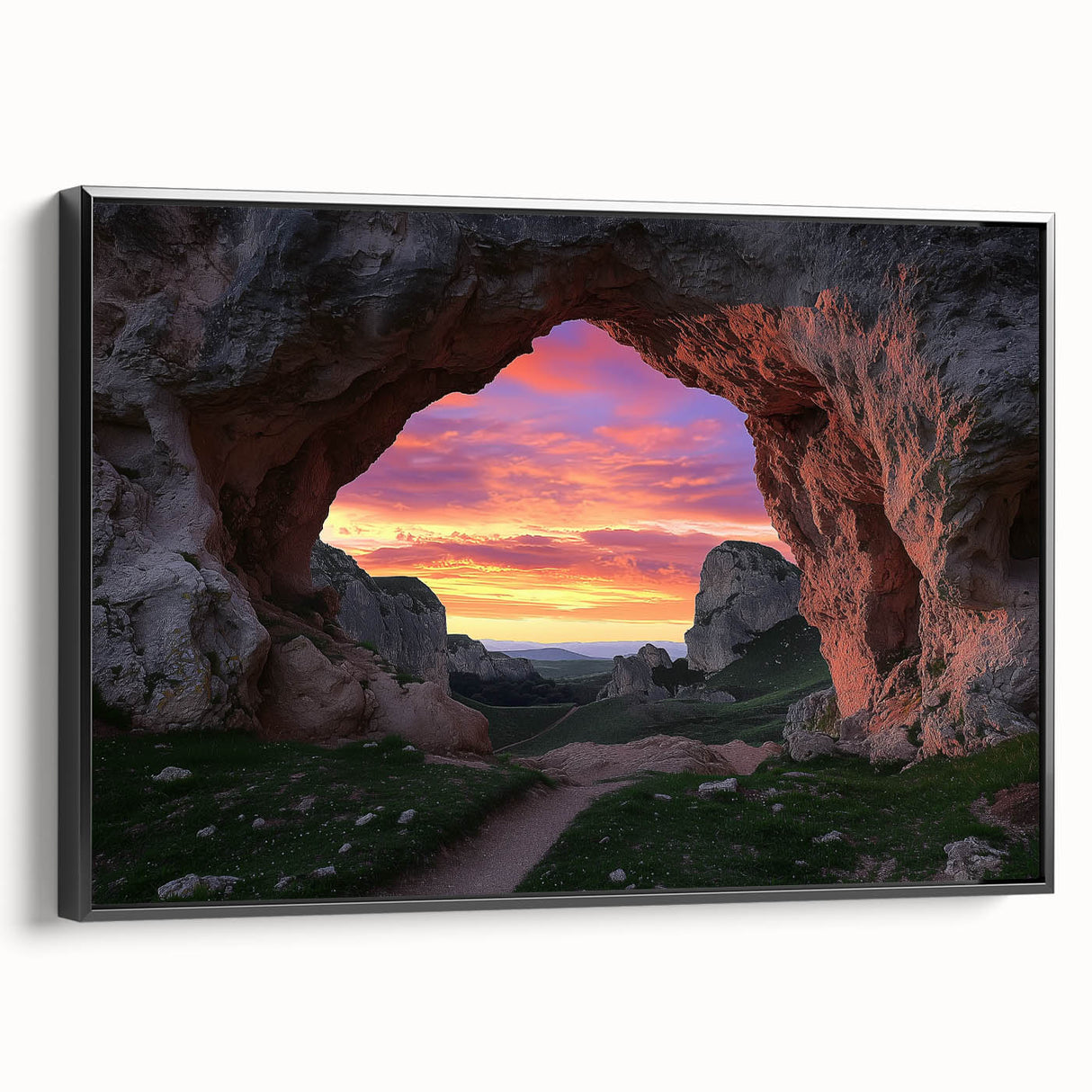Framed canvas artwork showcasing a vibrant landscape with caves, featuring a sleek black frame and side view that highlights texture and depth. Perfect for modern home decor.
