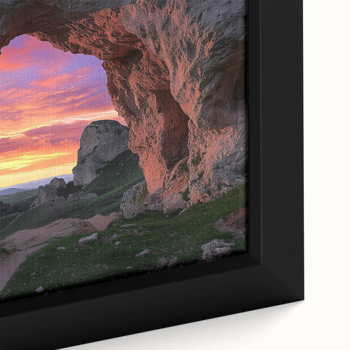 Close-up of a framed canvas print showcasing a vibrant landscape scene with intricate cave details, perfect for modern home decor and art enthusiasts.