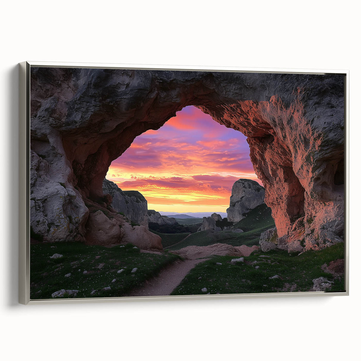 Framed canvas artwork showcasing a stunning landscape with intricate cave details, featuring a silver frame that enhances its elegance and depth. Ideal for modern home decor, this piece adds a touch of nature-inspired beauty to any living space.