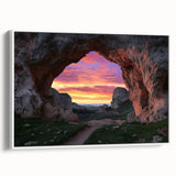 Framed canvas artwork showcasing a serene landscape with cave formations, displayed from a side view against a white background, ideal for modern home decor.