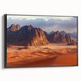 Framed canvas artwork showcasing a dramatic cliff landscape with vibrant colors and intricate details, presented in a sleek black frame, ideal for home decor.