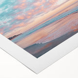 Vibrant rolled canvas artwork depicting a serene beach landscape with gentle waves, vibrant skies, and soft sands, packaged securely in a cardboard tube for safe delivery.