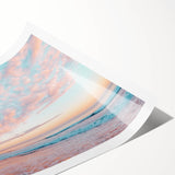 Stunning landscape canvas print showcasing a serene beach scene with vibrant colors and gentle waves, rolled and securely packaged in a protective cardboard tube for easy transport.