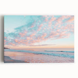Stretched canvas depicting a serene beach landscape at sunset, featuring vibrant colors and soft waves, perfect for enhancing coastal-themed decor.