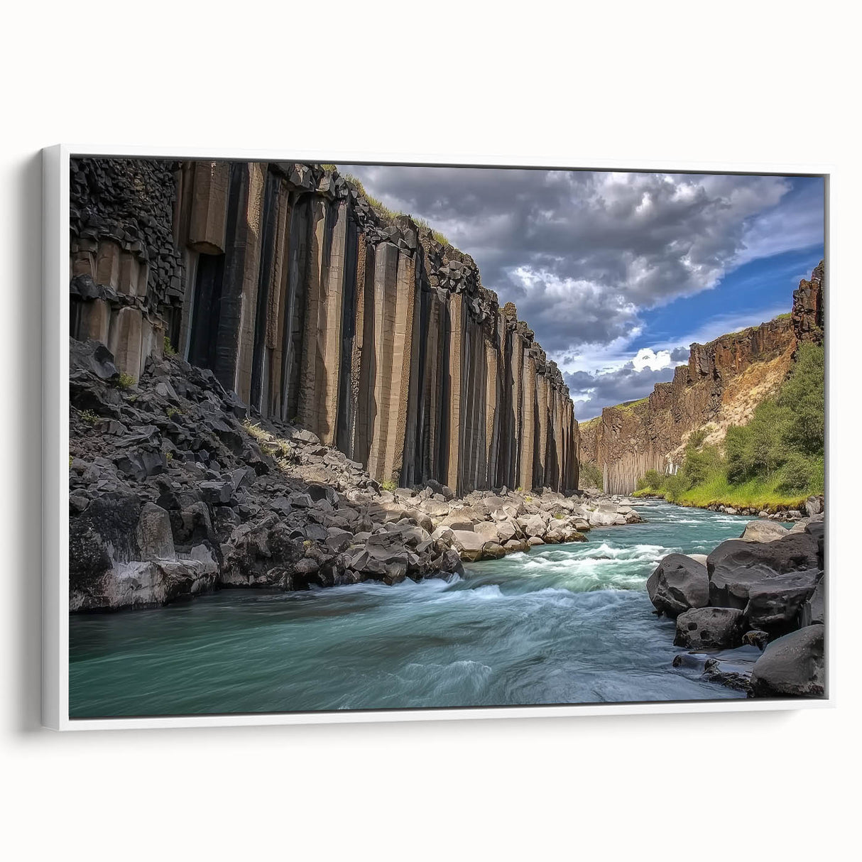 Framed landscape canvas showcasing a stunning canyon view with vibrant colors, set against a white border for an elegant display in home decor. Perfect for nature lovers and art enthusiasts.