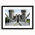 Framed landscape artwork depicting a serene castle scene with a black mat border, perfect for home decor or office settings, showcasing elegance and tranquility.