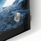Close-up of an abstract acrylic glass artwork depicting vibrant landscapes and intricate caves, showcasing bold colors and detailed textures, ideal for modern decor.