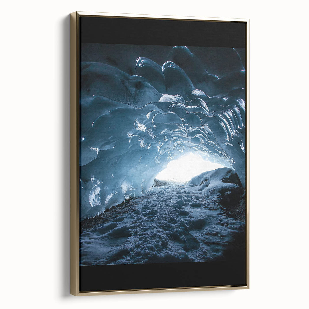 Framed canvas artwork showcasing a stunning landscape with cave formations, featuring a gold border and side view, perfect for enhancing home decor.