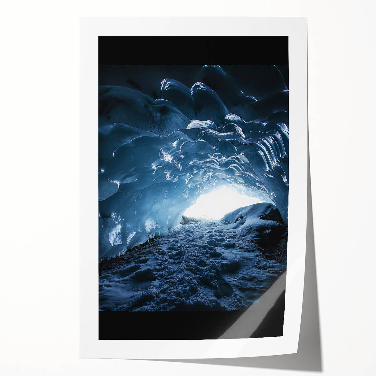 Colorful rolled print depicting a vibrant landscape with intricate cave formations, showcasing natural textures and deep hues, perfect for home decor or art enthusiasts.