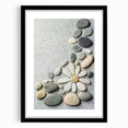 Black-framed landscape artwork featuring serene beach scene with soft waves and golden sand, ideal for coastal home decor. Perfect for adding tranquility to any room.
