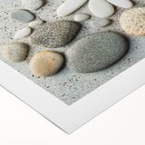 Rolled canvas showcasing a serene beach landscape with soft waves and blue skies, elegantly packaged in a protective cardboard tube for safe shipping.